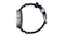 Side profile of titanium Apple Watch Ultra displaying side buttons, action button, and black ribbed flexible watch band Side profile of titanium Apple Watch Ultra displaying side buttons, action button, and black ribbed flexible watch band