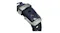 A close-up view of a rubber watch strap featuring a titanium buckle mechanism and strap loop with Nomad engraving A close-up view of a rubber watch strap featuring a titanium buckle mechanism and strap loop with Nomad engraving