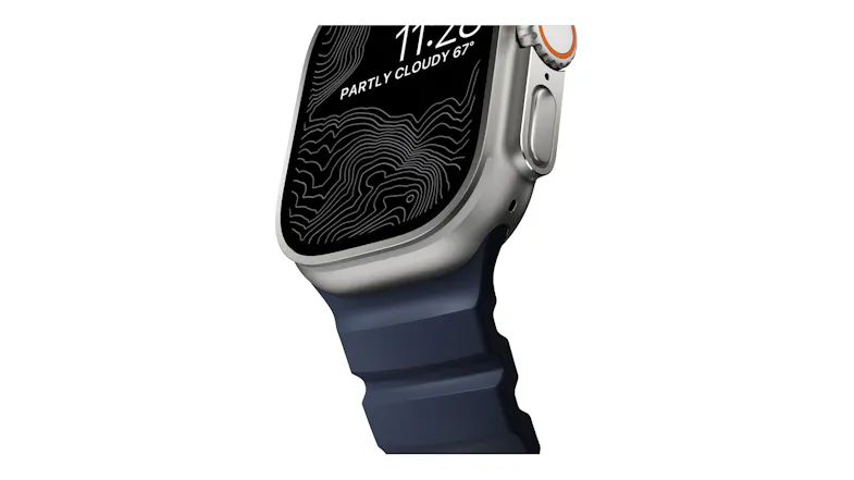 Close-up angle of Apple Watch Ultra titanium case lug attached to a ribbed rubber strap with topographic display Close-up angle of Apple Watch Ultra titanium case lug attached to a ribbed rubber strap with topographic display
