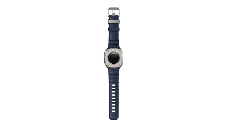 Full vertical back view of Apple Watch Ultra laid flat, showing heart rate optical sensors and black rubber watch band Full vertical back view of Apple Watch Ultra laid flat, showing heart rate optical sensors and black rubber watch band