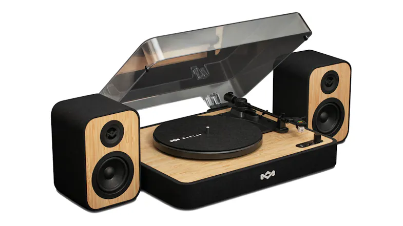 Angled view showing the turntable with open dark dust cover Angled view showing the turntable with open dark dust cover