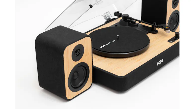 Side angle view highlighting the wood-grain speaker design Side angle view highlighting the wood-grain speaker design