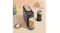 Lifestyle view of coffee maker with iced latte featuring frother and decor items Lifestyle view of coffee maker with iced latte featuring frother and decor items