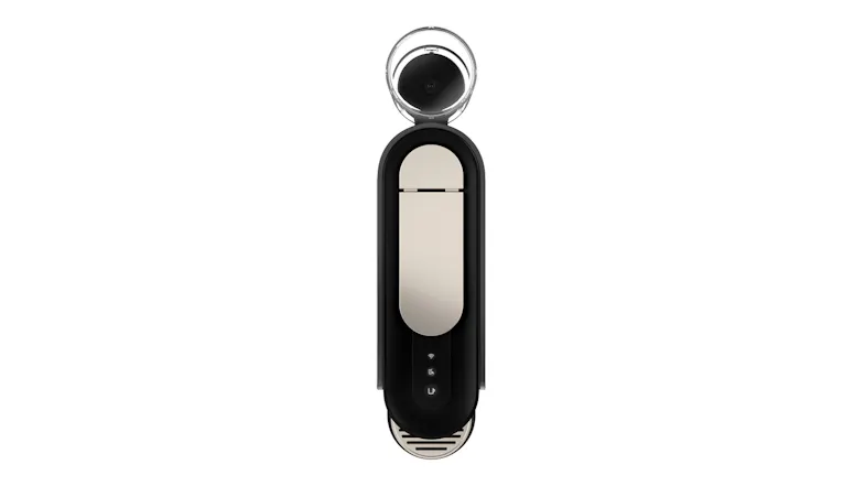 Top view of a coffee maker with an open lid featuring silver lever and control icons Top view of a coffee maker with an open lid featuring silver lever and control icons