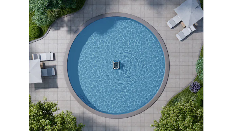 Aerial view featuring a robotic pool cleaner in a circular pool Aerial view featuring a robotic pool cleaner in a circular pool
