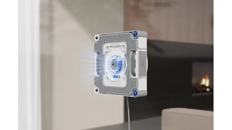 Close-up view showing a base station emitting spray mist while charging Close-up view showing a base station emitting spray mist while charging