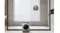 Indoor view highlighting a window cleaning robot operating on glass doors Indoor view highlighting a window cleaning robot operating on glass doors