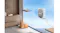 Angle view highlighting a window robot mounted on an outdoor glass pane Angle view highlighting a window robot mounted on an outdoor glass pane