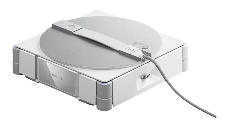 Top-down view of the robotic cleaner with a tether cable attached Top-down view of the robotic cleaner with a tether cable attached