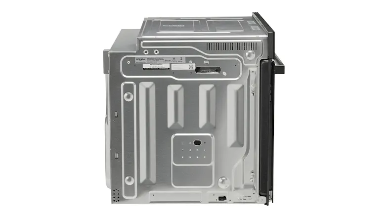 Rear view of the Whirlpool built-in oven showing the back panel design and appliance construction Rear view of the Whirlpool built-in oven showing the back panel design and appliance construction
