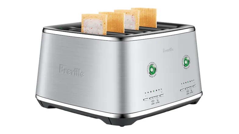 Angled view of the toaster highlighting toasted bread popping up Angled view of the toaster highlighting toasted bread popping up