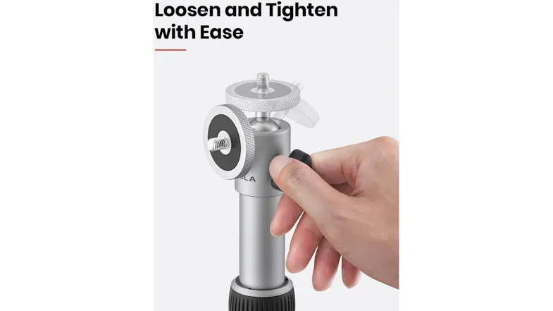 Close-up view of a hand tightening the metal stand with a black knob Close-up view of a hand tightening the metal stand with a black knob