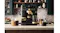 A view of multiple drinks and the Ninja Luxe Cafe Pro Machine displayed on an industrial-styled kitchen A view of multiple drinks and the Ninja Luxe Cafe Pro Machine displayed on an industrial-styled kitchen