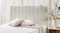 Close-up view of the Majestic Home Kyoto Queen Upholstered Headboard by Mlily in a modern bedroom Close-up view of the Majestic Home Kyoto Queen Upholstered Headboard by Mlily in a modern bedroom