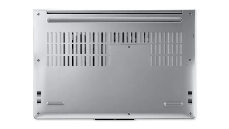Bottom view of the Acer Lite laptop showing vents and screws on metallic base Bottom view of the Acer Lite laptop showing vents and screws on metallic base