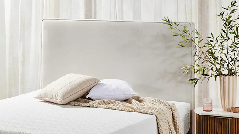 Close-up view of the Majestic Home Oslo Super King Upholstered Headboard by Mlily in a modern bedroom Close-up view of the Majestic Home Oslo Super King Upholstered Headboard by Mlily in a modern bedroom