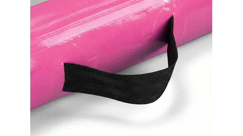 Close-up of a reinforced black carry handle attached to the side of a pink inflatable air track Close-up of a reinforced black carry handle attached to the side of a pink inflatable air track