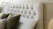 Close-up view of the Majestic Home Vienna Super King Upholstered Headboard by Mlily in a modern bedroom Close-up view of the Majestic Home Vienna Super King Upholstered Headboard by Mlily in a modern bedroom