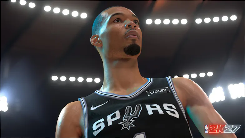Low-angle view showcasing a basketball player in a Spurs jersey Low-angle view showcasing a basketball player in a Spurs jersey