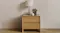 Cassie 2 Drawer Bedside Table featuring clean wooden drawers and minimalist decor items on the surface Cassie 2 Drawer Bedside Table featuring clean wooden drawers and minimalist decor items on the surface