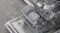 Top-down view of the Fisher & Paykel dishwasher loaded with plates, bowls, cups, and glasses Top-down view of the Fisher & Paykel dishwasher loaded with plates, bowls, cups, and glasses