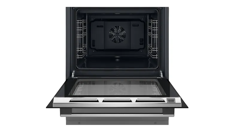 Front view of an open oven cavity highlighting telescopic rack rails Front view of an open oven cavity highlighting telescopic rack rails