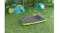 Lightweight inflatable air bed with cushioned top and pillow positioned on a grassy campsite Lightweight inflatable air bed with cushioned top and pillow positioned on a grassy campsite