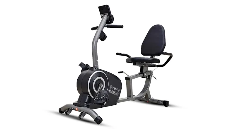 Angled view of a black recumbent exercise bike with padded cushion seat Angled view of a black recumbent exercise bike with padded cushion seat