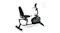 Left-angled view of a black exercise bike with padded seat Left-angled view of a black exercise bike with padded seat