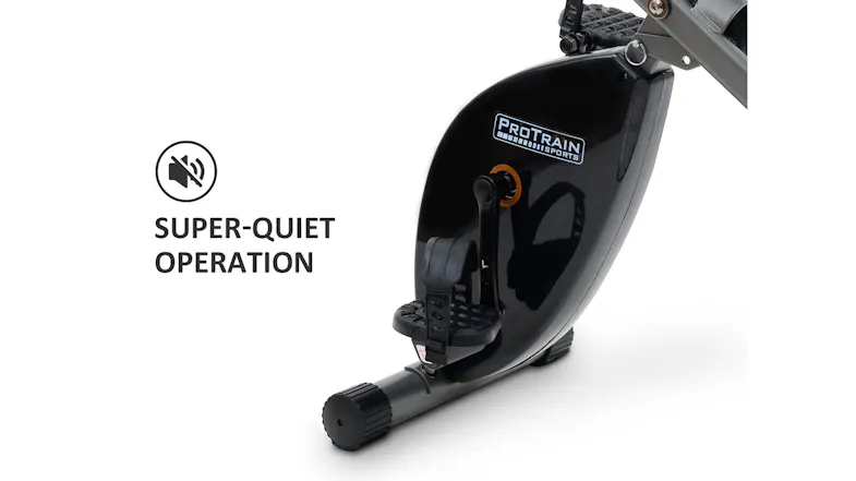 A close-up view of the exercise bike's flywheel housing and pedal, highlighting super-quiet operation A close-up view of the exercise bike's flywheel housing and pedal, highlighting super-quiet operation