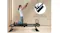 Woman kneeling on a Pilates reformer doing arm extensions, with an inset highlighting the non-slip floor mat Woman kneeling on a Pilates reformer doing arm extensions, with an inset highlighting the non-slip floor mat