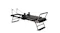 Side-angle view of a black folding Pilates reformer machine showcasing its frame, footbar, and attached straps Side-angle view of a black folding Pilates reformer machine showcasing its frame, footbar, and attached straps