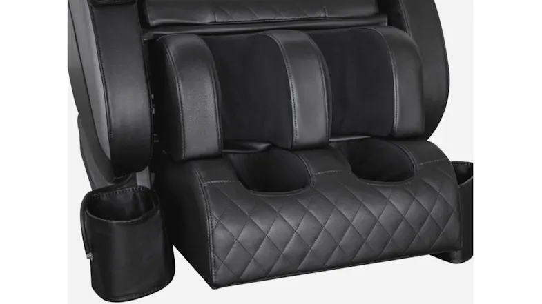 Close-up view of lower leg and foot massage module on Novello massage chair with quilted leatherette and cup holders Close-up view of lower leg and foot massage module on Novello massage chair with quilted leatherette and cup holders