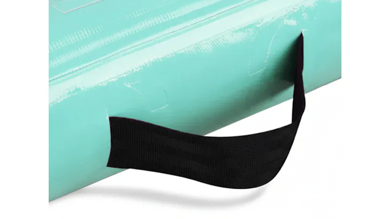 Close-up of a black carry handle securely attached to the green inflatable mat Close-up of a black carry handle securely attached to the green inflatable mat