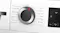 Detailed view of the control dial and digital display panel. Multiple wash and dry programmes are visible Detailed view of the control dial and digital display panel. Multiple wash and dry programmes are visible
