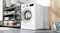 Bosch Series 6 washer dryer combo displayed in a modern laundry room with the door open Bosch Series 6 washer dryer combo displayed in a modern laundry room with the door open