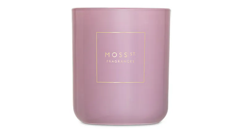Front view showcasing a cylindrical Moss St. scented candle Front view showcasing a cylindrical Moss St. scented candle