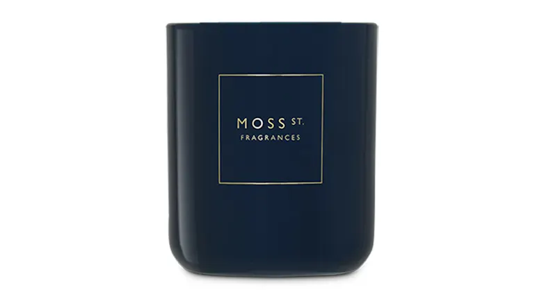 Front view showcasing a cylindrical Moss St. scented candle Front view showcasing a cylindrical Moss St. scented candle
