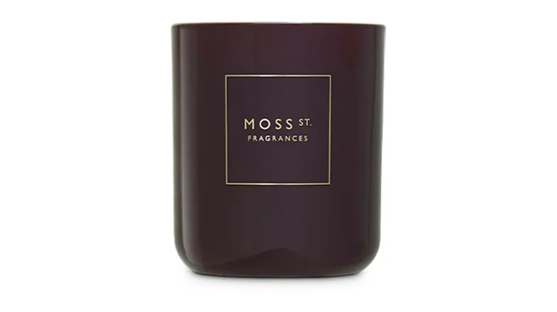 Front view showcasing a cylindrical Moss St. scented candle Front view showcasing a cylindrical Moss St. scented candle