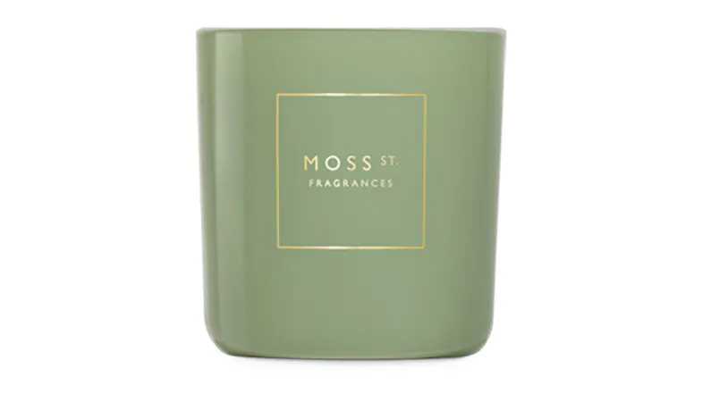 Front view showcasing a cylindrical Moss St. scented candle Front view showcasing a cylindrical Moss St. scented candle