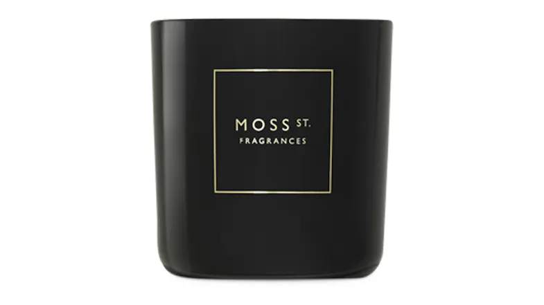 Front view showcasing a cylindrical Moss St. scented candle Front view showcasing a cylindrical Moss St. scented candle
