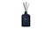 Front view showcasing a Moss St. reed diffuser with black sticks Front view showcasing a Moss St. reed diffuser with black sticks