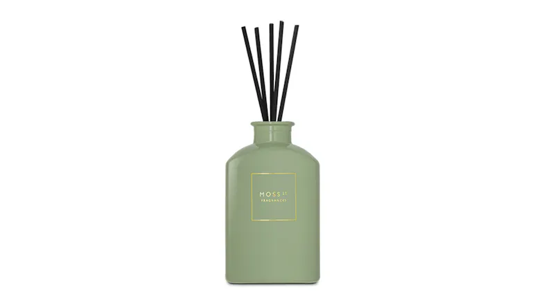 French Pear & Freesia Mini diffuser in a muted green glass bottle with black reeds French Pear & Freesia Mini diffuser in a muted green glass bottle with black reeds