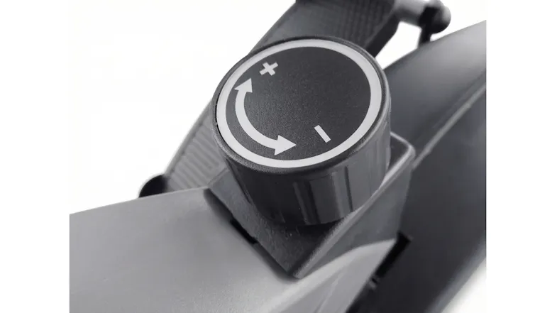 Manual resistance dial on an elliptical trainer for personalised cardio and fitness training Manual resistance dial on an elliptical trainer for personalised cardio and fitness training