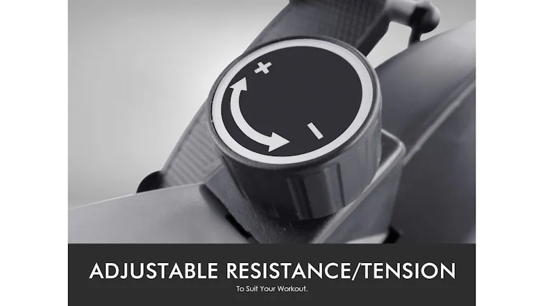 Close-up of a resistance knob on an exercise bike showing plus and minus symbols for adjustable tension Close-up of a resistance knob on an exercise bike showing plus and minus symbols for adjustable tension