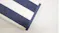 Close-up of Baksana Beach Towel featuring navy blue and white stripes with plush cotton texture Close-up of Baksana Beach Towel featuring navy blue and white stripes with plush cotton texture