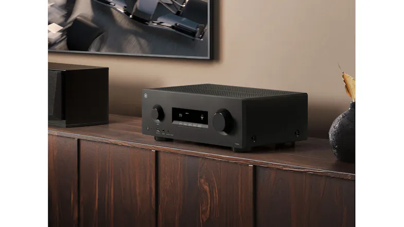 Audio box on a wooden cabinet highlighting its sleek design Audio box on a wooden cabinet highlighting its sleek design
