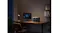 Anker SOLIX portable power station powering a desktop computer in a home office at night Anker SOLIX portable power station powering a desktop computer in a home office at night