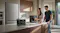 Anker SOLIX portable power station powering a coffee machine on a kitchen island during breakfast Anker SOLIX portable power station powering a coffee machine on a kitchen island during breakfast