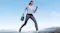 An outdoor enthusiast carrying a compact power station along a scenic shoreline for mobile power access An outdoor enthusiast carrying a compact power station along a scenic shoreline for mobile power access